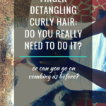 Person detangling curly hair with a wide-tooth comb